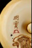 Manjū netsuke depicting Kintarō wrestling with a snake (detail)