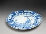 Plate with ‘Parasol Lady’ design (oblique)