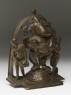 Dancing figure of Ganesha with attendants (side)