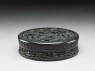 Tortoiseshell box with figures in a garden (oblique)