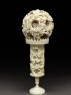 Ivory ball and stand with floral decoration (side)