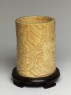 Ivory brush pot with figures in a landscape (oblique)