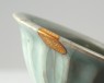 Greenware bowl with lotus petals (oblique)