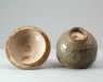 Greenware bowl and lid with floral decoration (oblique)