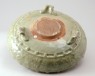 Greenware narcissus bowl with animal mask feet and begonia decoration (oblique)