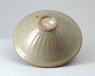 Greenware bowl with floral decoration (oblique)